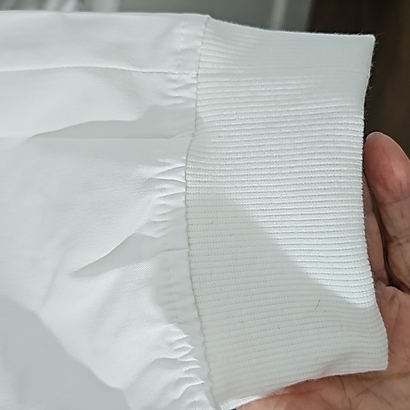 Scrubs, butter-soft. White with lots of pockets.  Cuff style. Size small… - Picture 4 of 8